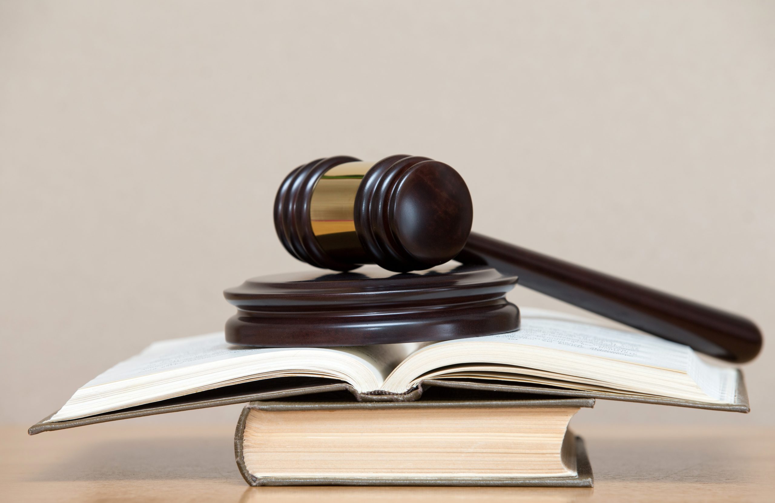 wooden gavel and books